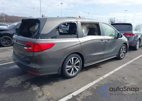 2021 Honda Odyssey Touring z USA, uszkodzony, nr VIN 5FNRL6H8XMB006701